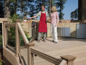 Couple cooking in their outdoor living space - American Home Services, your Orlando home inspection company will inspect your outdoor space as part of their inspection process.